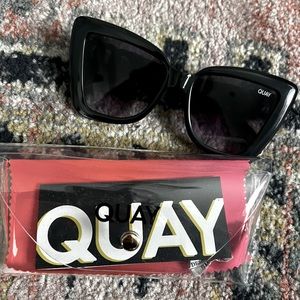 Brand new Quay Sunglasses. Never worn.